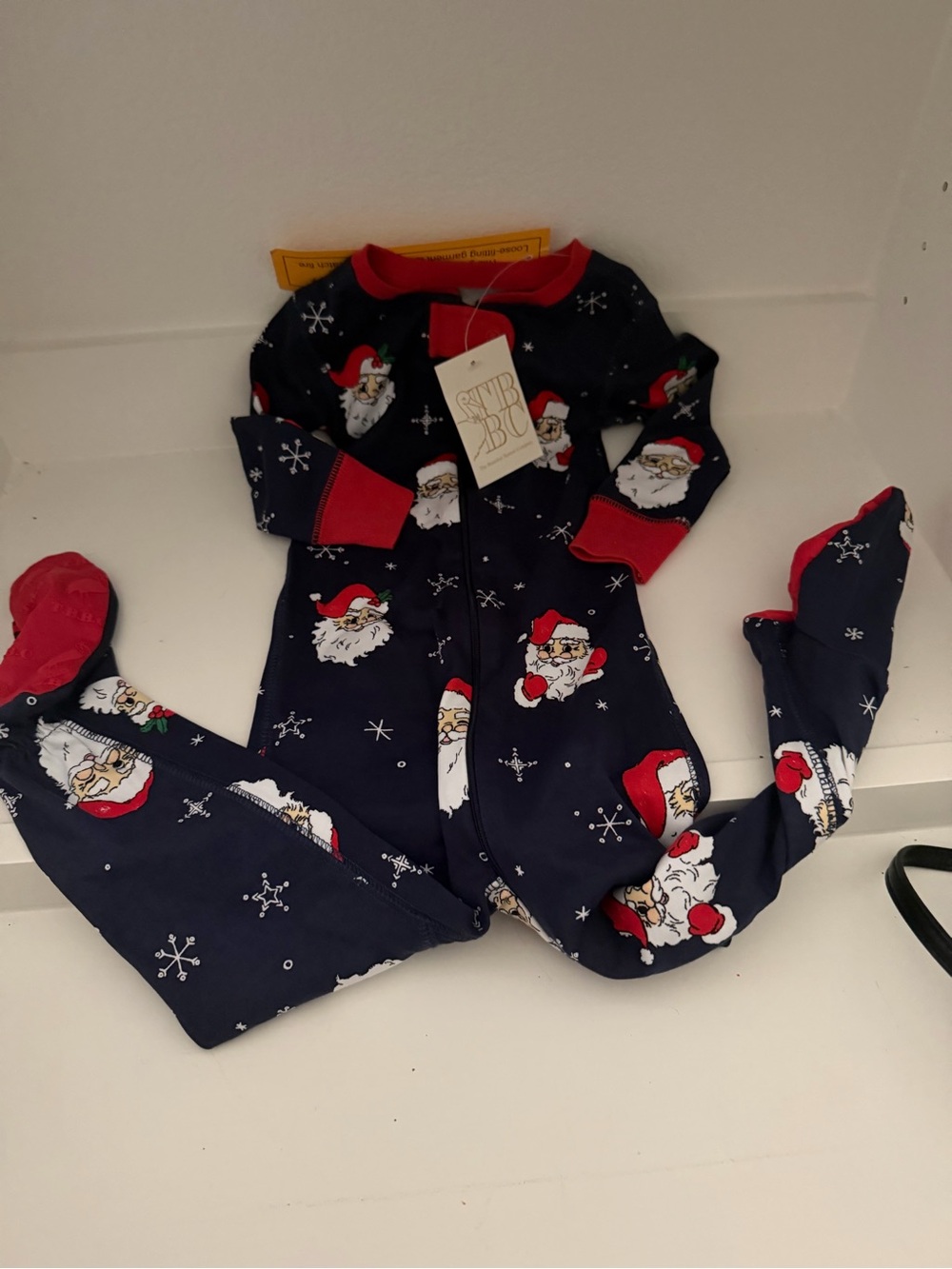 The Beaufort Bonnet Company Navy and Red Santa Print Kids One-Piece Footie